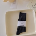 Dark grey ribbed cotton crew socks for women with minimalist packaging on a tray - Dark Gray