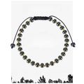 Detail view of woven hematite stone bracelet with gold beads on grounding energy card - Magnetic Stone Bracelet