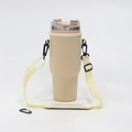 Detailed view of beige 40oz tumbler pouch with adjustable shoulder strap and black carabiner - Large Cup Sleeve Beige