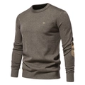 Detail of coffee brown knit sweater featuring elbow patches and a chest logo - S / Light Coffee