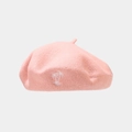 Detailed view of the soft pink wool beret featuring a delicate white coconut tree embroidery - Pink