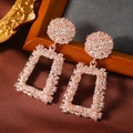 Detailed view of rose gold geometric square earrings with hammered texture on silk fabric - Round Rectangle Frame Style (WEH3965) / Rose Gold (WEH3965)
