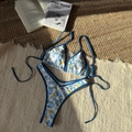 Floral print two-piece bikini set with blue contrast trim and tie-side bottoms - S / Blue Floral