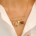 Detail of vintage gold safety pin necklace with rhinestone cross and religious charms - 03 KC Gold (0224)