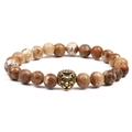 Beaded bracelet featuring brown natural map stone and a golden lion head charm - Picture Stone + Gold