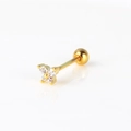 Detailed macro view of gold flower cartilage stud with sparkling white zircons - White Zircon