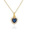 Detail of 18K gold heart pendant with blue gemstone and micro-pave zircon crystals - Blue