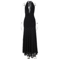 Detail van een sexy maxi-jurk met halternek, stippen van mesh en tailleplooien - S / Zwart