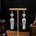 Bohemian silver butterfly earrings with hollow ball pendant and long metal tassels - Butterfly Hollow Tubular Tassel Style (E6007)