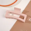 Detail view of the matte pale pink rectangular hair claw clip for long hair styling - 13cm Rectangular - Matte Korean Pink