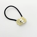 Detail of black elastic hair tie with a textured golden metallic hammered wavy buckle - 19# Gold Hammered Style
