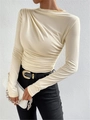 Camiseta ajustada de manga larga en color crema con elegantes detalles de pliegues laterales - S / Tops / Albaricoque