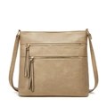Minimalistische khakifarbene Tragetasche mit Goldreißverschlüssen und Lederquasten - Khaki