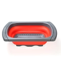 Collapsible silicone kitchen colander in red and gray finish for easy storage - Extendable Over Sink Colander / Red