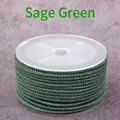 Deep green 2mm woven pineapple cord for DIY jewelry making on a white plastic spool - Autumn Green
