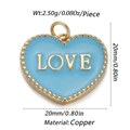 Close-up of a 20mm light blue enamel heart charm with LOVE text and brass details - Cx154-02 / 18K Gold