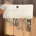 Silver geometric earring set with pearls and textured hoops on a jewelry display card - 48 White K (1054)