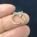 Golden crown septum ring with micro-paved green and clear cubic zirconia stones - Crown Shape
