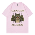 Light pink cotton T-shirt featuring Alligator Alcatraz graphic and crew neck design - Pink