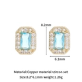 Light blue rectangular zircon stud earrings in copper with dimensions of 8.2mm by 6.1mm - 8.2x6.1mm / Aqua