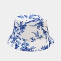 Detailed view of the white bucket hat featuring a vintage blue Toile de Jouy floral print - Blue and White Porcelain Toile de Jouy (Color 4#)