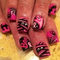 Detailed view of Halloween press-on nails featuring spooky ghost and mummy patterns - Pink Black Cartoon Mummy Ghost Style (CW750)
