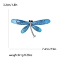 Spilla a libellula argentata con ali blu e strass completa di misure del prodotto - Blu