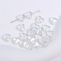 Iridescent heart-shaped glass beads for jewelry making shown on white background - Heart-8mm-Clear