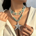 Bohemian multi-layer necklace with turquoise beads, pearls and large silver starfish - White K 6357
