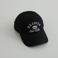 Detailed close-up of white embroidery on a black cotton baseball cap for boys - 52-54cm (3-8 Years) / Black