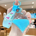 Blue liquid bear keychain with glitter floating oil bag and matching silicone wristband - Candy Bag - Blue