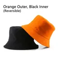 Double-sided reversible cotton bucket hat in vibrant orange and classic black - Orange Outside Black Inside (Reversible)