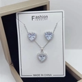 Silver tone heart jewelry set with necklace and stud earrings featuring white zircons - Silver Color Clear Zirconia