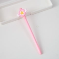 Pink cartoon pen with yellow star and white wings design on a clean white desk - Large Star Wings