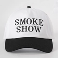 Detailed close-up of embroidered SMOKE SHOW text on a black and white cotton baseball cap - White and Black Splicing