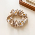 Champagne gold satin daisy print scrunchie with high elasticity and silk-like shine - Apricot