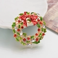 Detail of a Christmas wreath brooch with red enamel bow and sparkling rhinestones - Z352 Wreath
