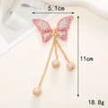 Ciondolo a farfalla in lega con cristalli, perle e dettagli dimensionali 5,1x11cm - D446 Farfalla con bordo rosa