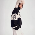 Oversized black and white winter knit sweater featuring snowflake motifs and side view - S / Black