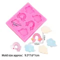 Pink silicone mold with rainbow and cloud shapes for DIY fondant or clay crafts - Pink