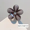 Mini pince à cheveux fleur 2cm en résine foncée avec paillettes et cristal central - Noir