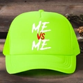 Top view of neon green trucker hat with ME VS ME print on rustic wood background - One Size / Neon Green