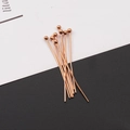 Close-up of rose gold stainless steel headpins for DIY jewelry making and beading - Ball Head Pin Rose Gold