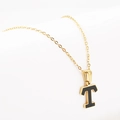 Gold-tone titanium steel necklace featuring a letter T pendant with black inlay detail - Gold-T
