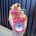 Mini alarm clock keychain in pink finish with a small bell and silver metal clip - Rose Red