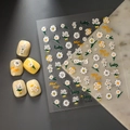 3D embossed daisy flower nail stickers with white petal designs and sparkling crystals - Yellow Daisy Text Style (CO-204)