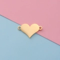 Close-up of golden stainless steel heart-shaped connector for DIY jewelry making - 18K Gold Plated