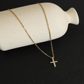 Detail of gold chain necklace with a cross pendant featuring micro-set cubic zirconia - Gold-Style A-Pave Cross