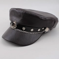 Detail of dark brown faux leather beret with silver chain and anchor pendant accent - One Size 58cm / Brown Anchor Style
