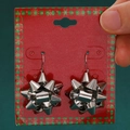 Silver bow knot earrings on festive red card for Christmas jewelry collection - White Bowknot (H-230)